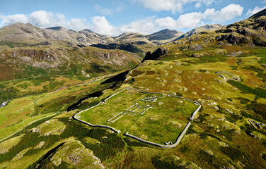 Hardknott Roman Fort Mediobogdum on Hardknott Fell. Lake District National Park, Cumbria. Aerial looking N over Upper Eskdale to Scafell and Bowfell