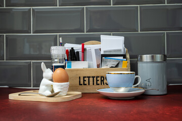 breakfast time with a boiled egg earl grey tea whilst opening the morning mail