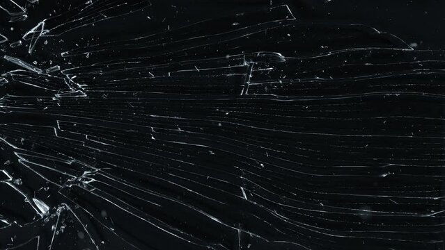 Super Slow Motion Shot of Breaking Real Glass at 1000 fps. Isolated on Black Background.