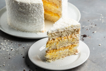 coconut cake with cream cheese. Food recipe background. Close up. Layered mango cake