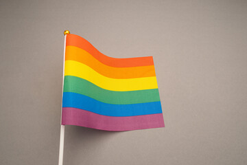 Rainbow flags (LGBT flag) on a gray background