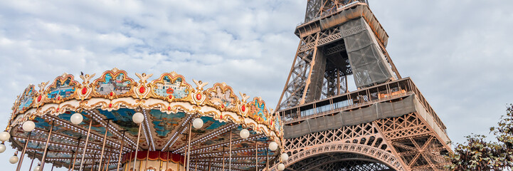 Carrousel and Eiffel Tower a day of Autumn in Paris, France