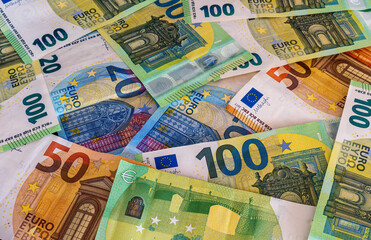 concept background of colorful euro cash banknotes close up , money backdrop for design