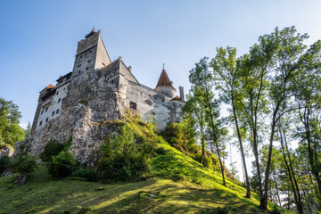 Fototapeta na wymiar Bran Castle in suuny day best known as Dracula's Castle, home of Vlad Tepes Dracula, Brasov, Transylvania, Romania