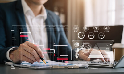 Businessman hand working with virtual innovation Operations management involving business process on computer dashboard.
