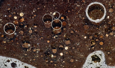 Transparent surface with water inside.