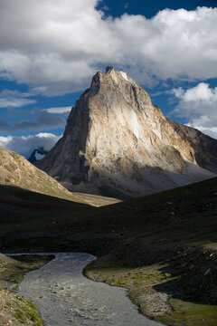 Sun sets near Gumbaranjan Mountain in Zanskar Range of northern India.