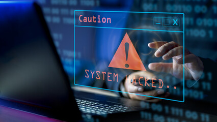 A computer popup box screen warning of a system being hacked, System hacked alert after cyber...