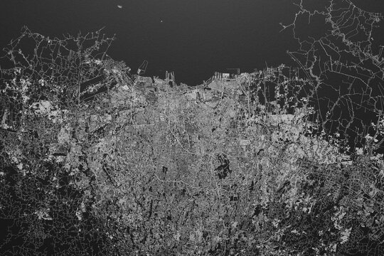 Street map of Jakarta (Indonesia) on black paper with light coming from top