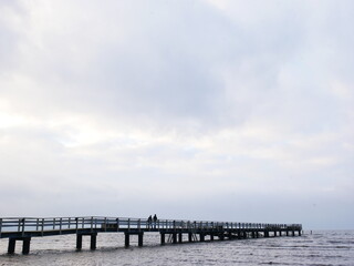 Fototapeta na wymiar Wood bridge and sauna on the Kattegat sea.