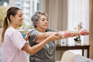 Women, senior or physiotherapy help with dumbbell in wellness clinic, healthcare center or nursing...