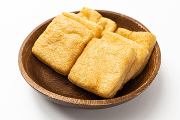square fried tofu on a white background