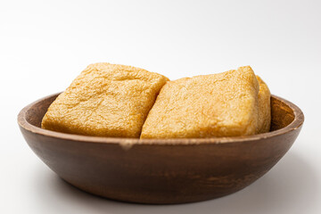 square fried tofu on a white background