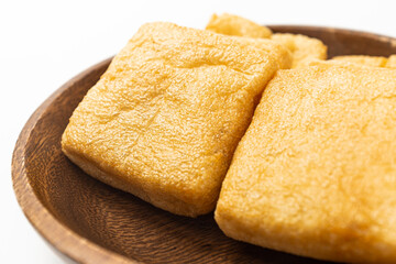 square fried tofu on a white background