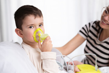 Mom and son are doing inhalation due to flu.