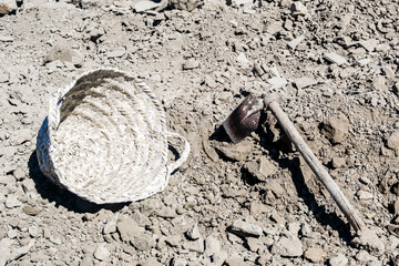 Heap of clay and equipment used in pottery factory in Fez, Morocco.