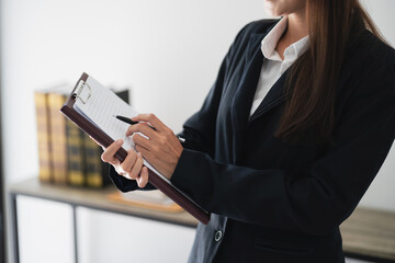 Lawyer businesswoman working with consult. Legal law Judge Gavel Scale of Justice concept.