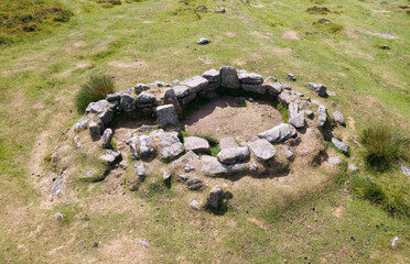 Grimspound Bronze Age enclosed settlement on Dartmoor north of Widecombe in the Moor. Aerial of interior showing one of the 24+ stone hut circles