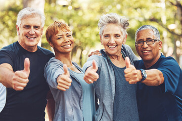 Senior fitness group, thumbs up and portrait with smile, diversity and happiness in park for wellness. Happy workout friends, retirement and hand gesture for motivation, teamwork and focus for health