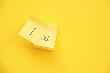 Calendar page with date on a yellow background.