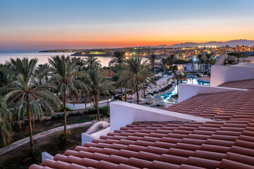 Fototapeta premium Sunset over Egyptian city. Beautiful summer landscape