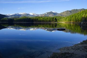 Beautiful view of Lake Eibsee with reflection in the mountains.