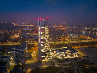 Fototapeta na wymiar Hungary - Budapest landscape with the amazing highest skyscraper (MOL HQ) from drone view at night