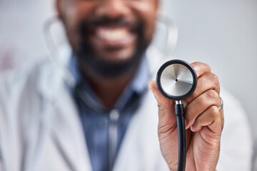 Doctor, healthcare and closeup of stethoscope in hospital for a heart or lung consultation. Professional, cardiology and nurse with medical equipment to examine chest or breathing in medicare clinic.