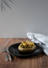 Delicious artichokes on black plate