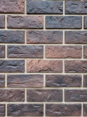 Brown brick wall. Style geometrical background with copy space. Rustic brick backdrop with place for text.