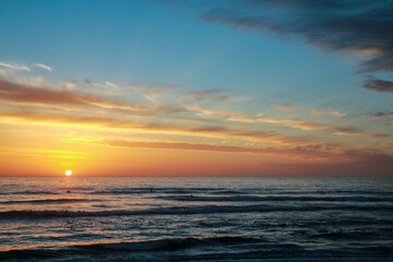 Beautiful sunset at the atlantic ocean in portugal close to lissabon. Wallpaper surf