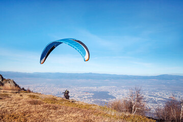 Paraglider at the start above the city of Sofia ,Bulgaria 