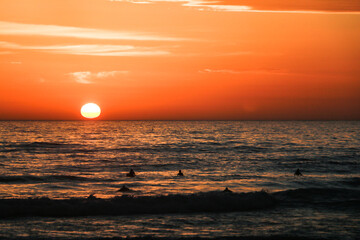 Beautiful sunset at the atlantic ocean in portugal close to lissabon. Wallpaper surf