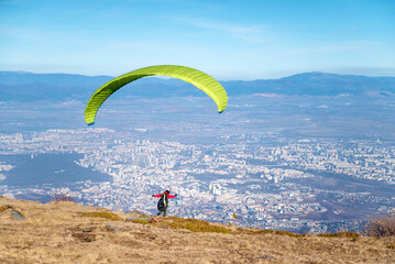 Paraglider at the start above the city of Sofia ,Bulgaria 