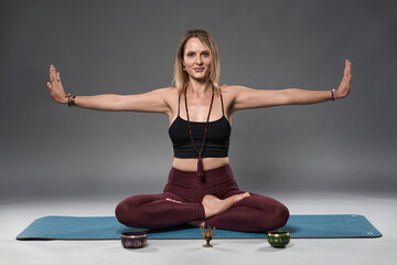 Woman yoga practitioner exercising