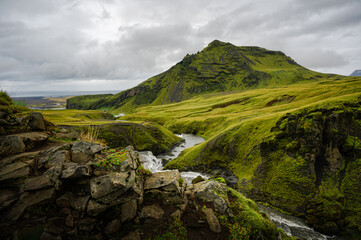 Typical and wonderful Icelandic landscape around Skogafoss, with its moss covered volcanic rocks. Iceland