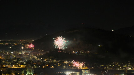 Fototapeta premium Fireworks over small town