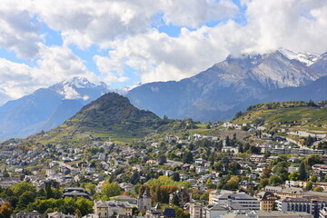 Fototapeta na wymiar View from the Tourbillon Castle which is a castle in Sion in the canton of Valais in Switzerland