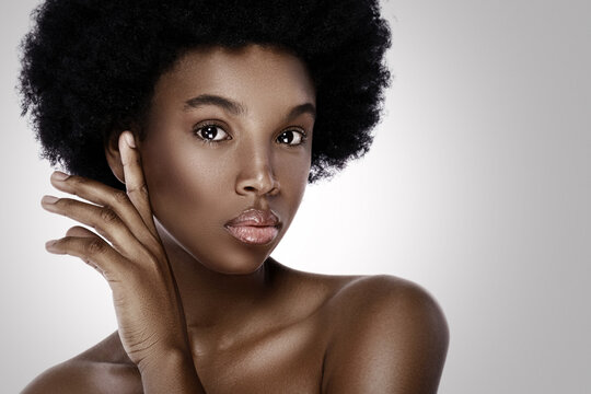 Young and beautiful black woman with smooth skin