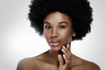 Fototapeta na wymiar Young and beautiful black woman with smooth skin