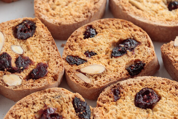 Biscotti cantucci cookies with almond and cranberry on white background