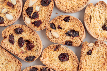 Biscotti cantucci cookies with almond and cranberry on white background