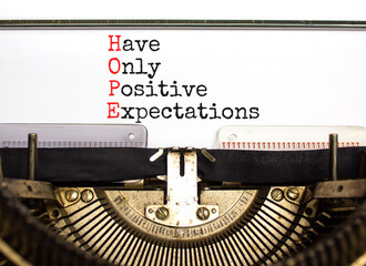 HOPE have only positive expectations symbol. Concept words HOPE have only positive expectations on typewriter on beautiful white background. Business HOPE have positive expectations concept Copy space