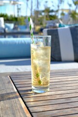 glass of ginger soda on the wooden table