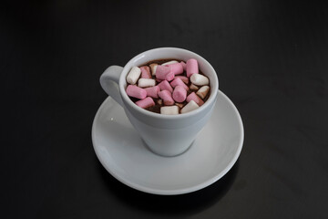 Taza de Chocolate caliente con nubes de azucar