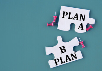Plan A and Plan B concept on mosaic puzzles on a dark green background