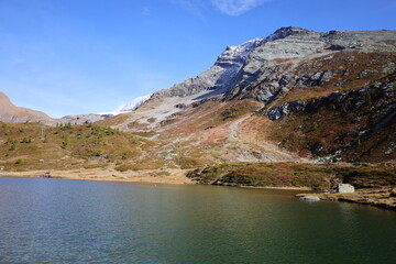 View on a lake in the Simplon Pass is a high mountain pass between the Pennine Alps and the Lepontine Alps in Switzerland.