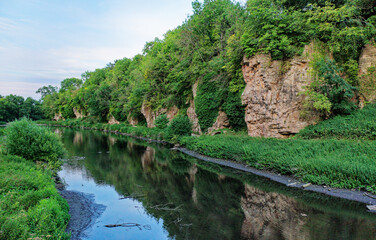 Creswell Crags prehistoric site. Caves both sides limestone gorge occupied 43,000 years from last...