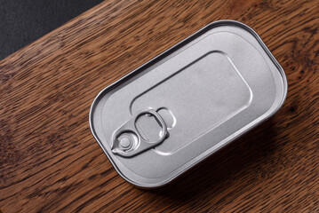 Fototapeta na wymiar Tin or aluminum rectangular can of canned food with a key