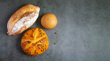 Bakery background with freshly baked bread on table